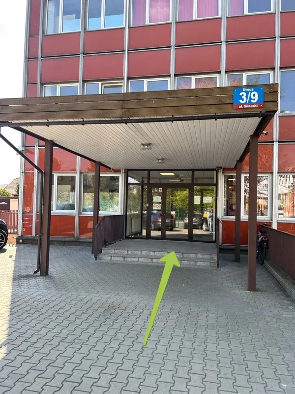 Building entrance — wooden canopy